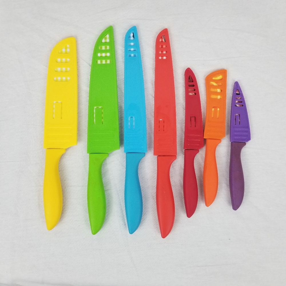Set of 7 Tomodachi knife set with checkerboard & fruit & veggie pattern.